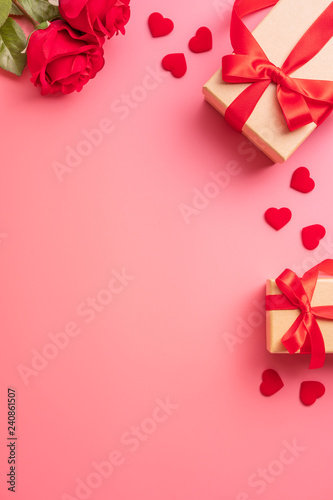 Kraft Gift box with beautful red ribbon and rose, concept of Valentine's, anniversary, mother's day and birthday greeting, copy space, top view.