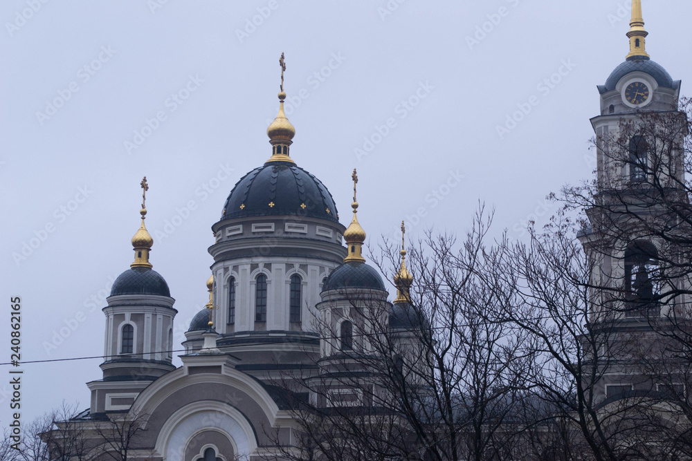 The church with golden domes in the city