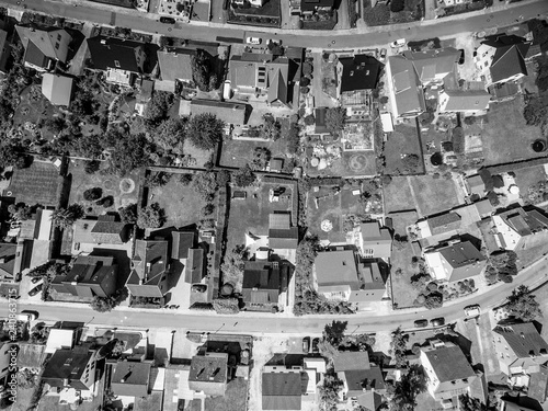 Aerial picture of a residential area with houses and gardens from a height of 100 m photo