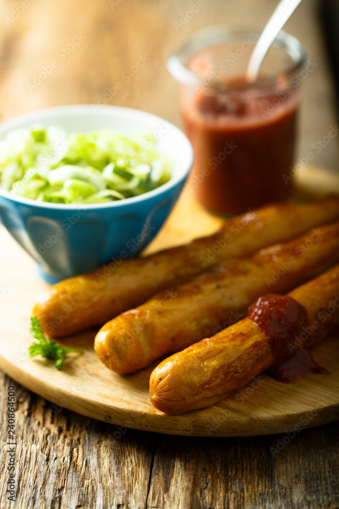 Fried sausages with strawberry ketchup