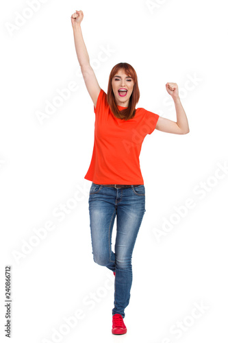 Happy Young Woman Is Standing On One Leg And Cheering