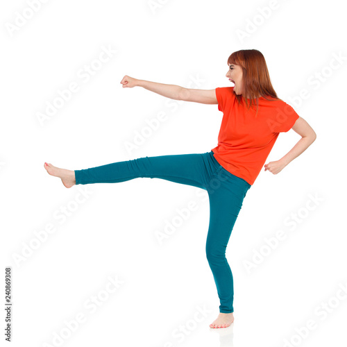 Barefoot Young Woman Is Kicking And Shouting