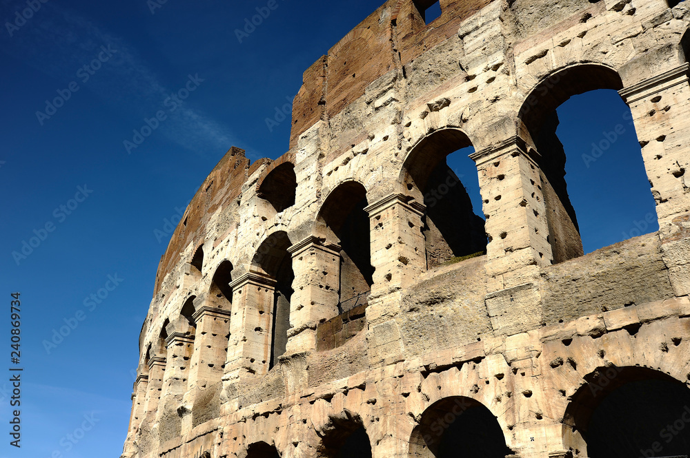 A section of the facade of the Colosseum (Flavian Amphitheatre) in Rome, Lazio, Italy