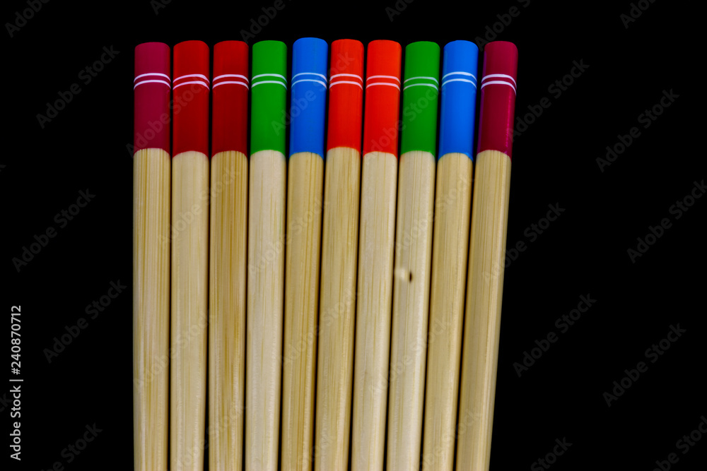 Obraz premium Wooden Chopsticks Isolated on a Black Background