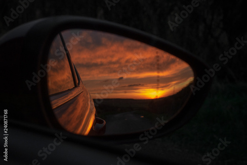Car Mirror With Sunset © Adam