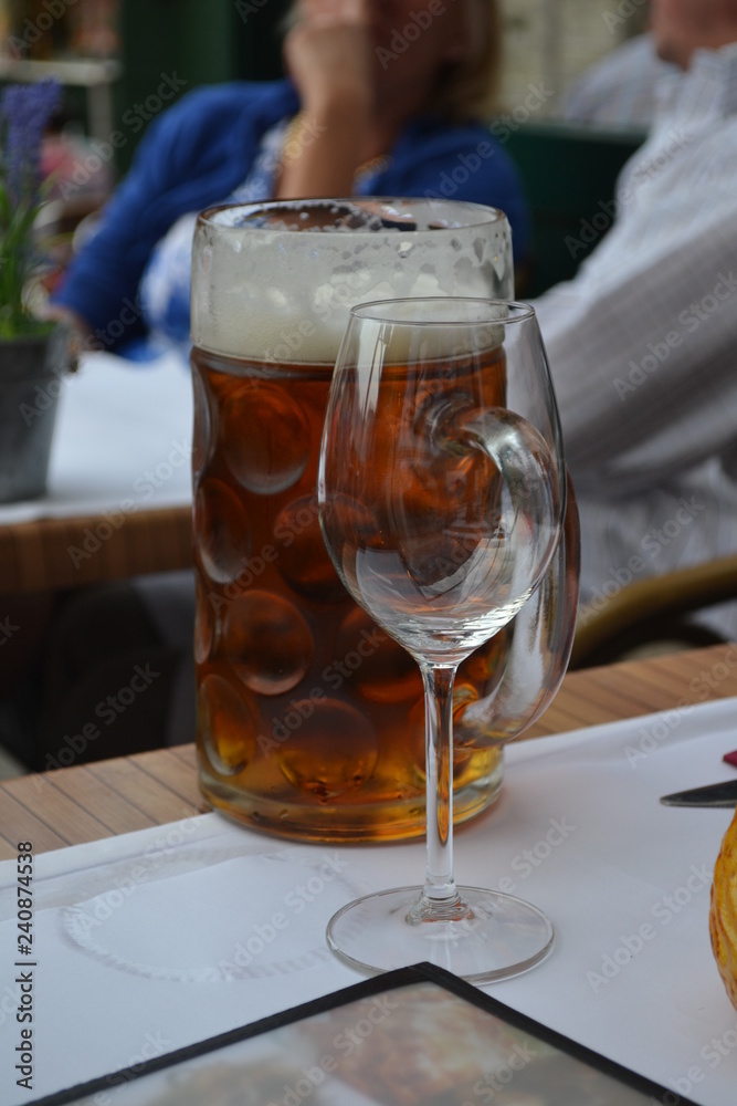 full beer glass, empty wine glass full beer glass, empty wine glass
