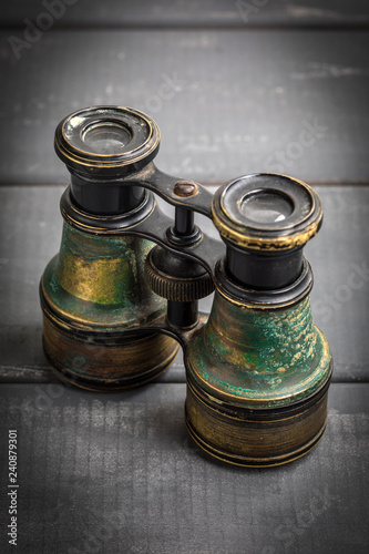 Old binoculars covered with patina.