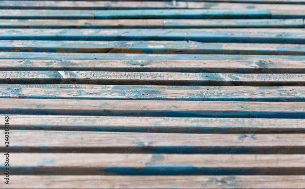 Old wooden boards on a bench as background Old wooden boards on a bench as background