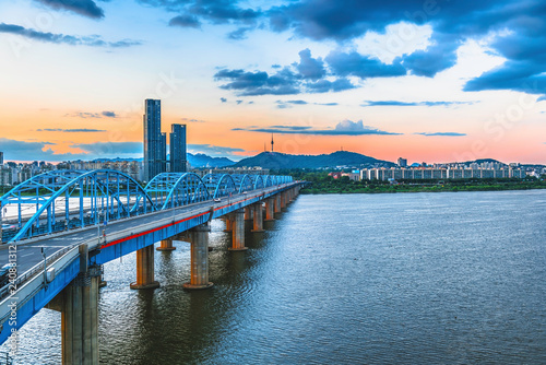 Seoul skyline at Dongjak Bridge and Han River in Seoul, South Korea photo