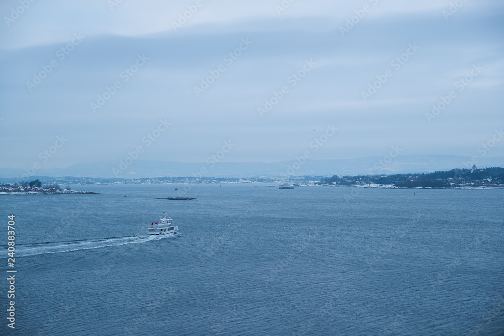 The islands around Oslo Norway during the winter overlooking the sea and the Fjord