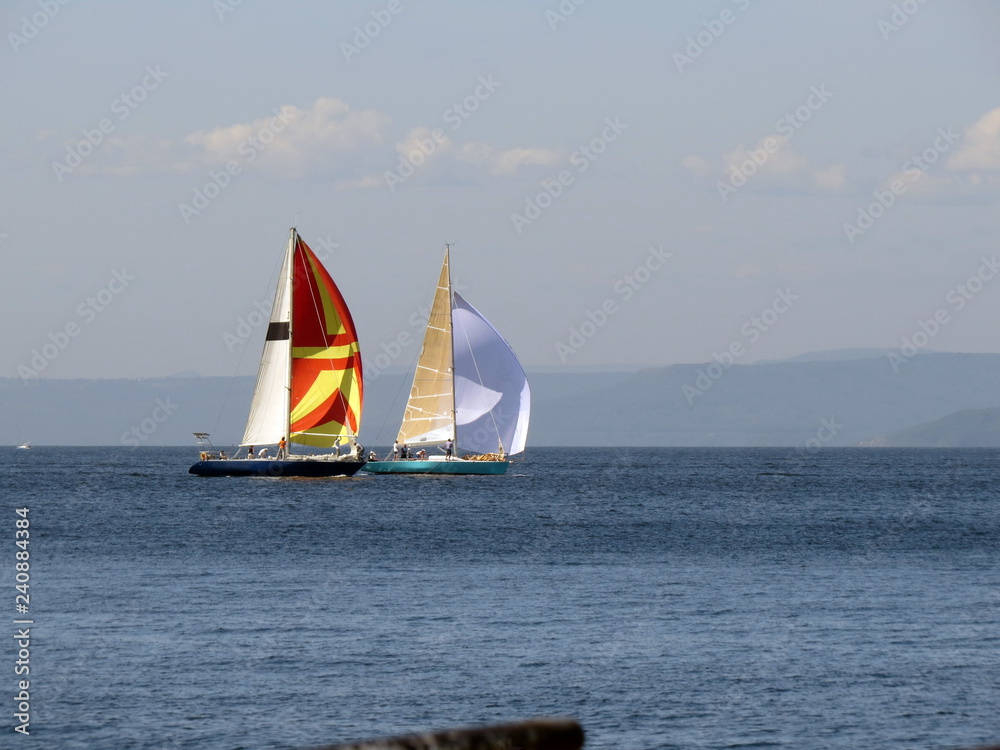 Fototapeta premium Two yachts sailing on the sea