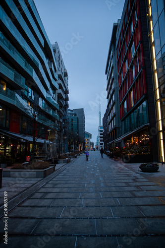 Photography Modern architecture of the city of Oslo Norway during the winter with Christmas decoration in the snow-covered center