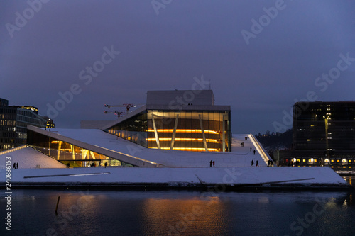 The Oslo building of the Oslo Theater building during winter is covered with snow