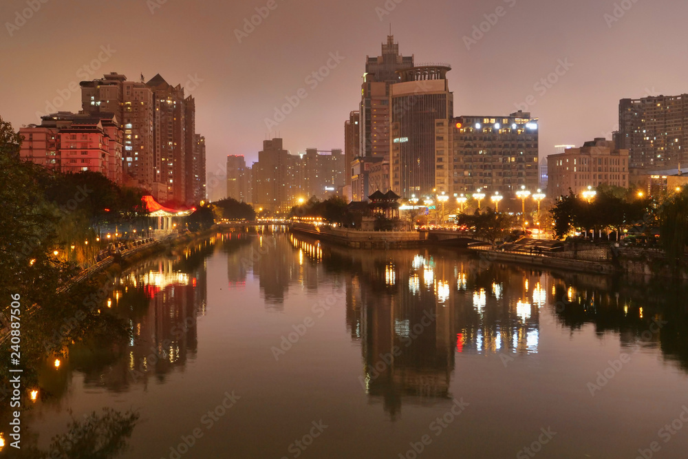 Fototapeta premium Nighttime Cityscape reflections on the water