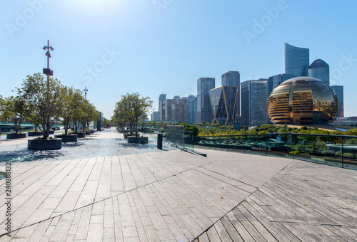 Panoramic skyline and buildings with empty concrete square floor，Qianjiang New Town，hangzhou,china photo