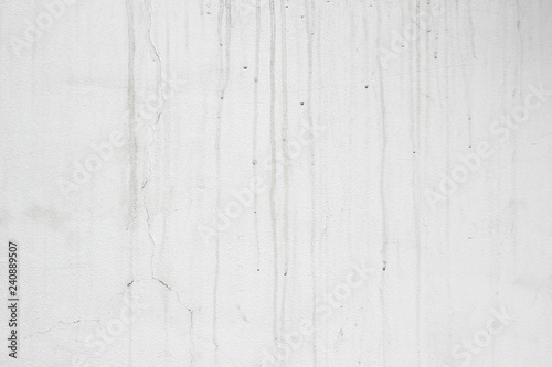 Facade wall white grey gray dirty marks streaks surface close up