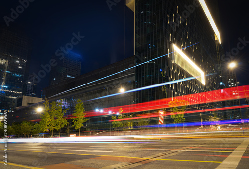 abstract image of blur motion of cars on the city road at night   Modern urban architecture in hangzhou  China