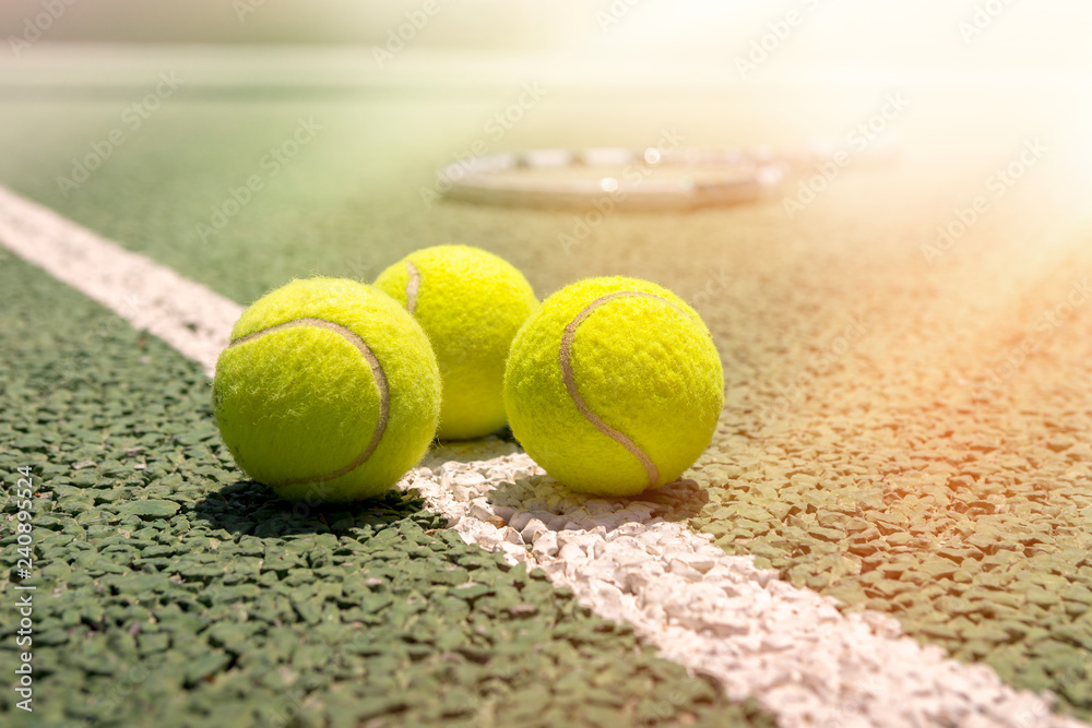 Tennis balls on a outdoor court