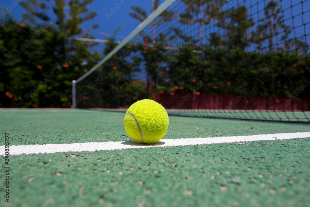 Tennis ball on a outdoor court