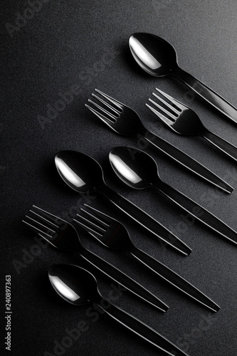 Black plastic spoon and fork