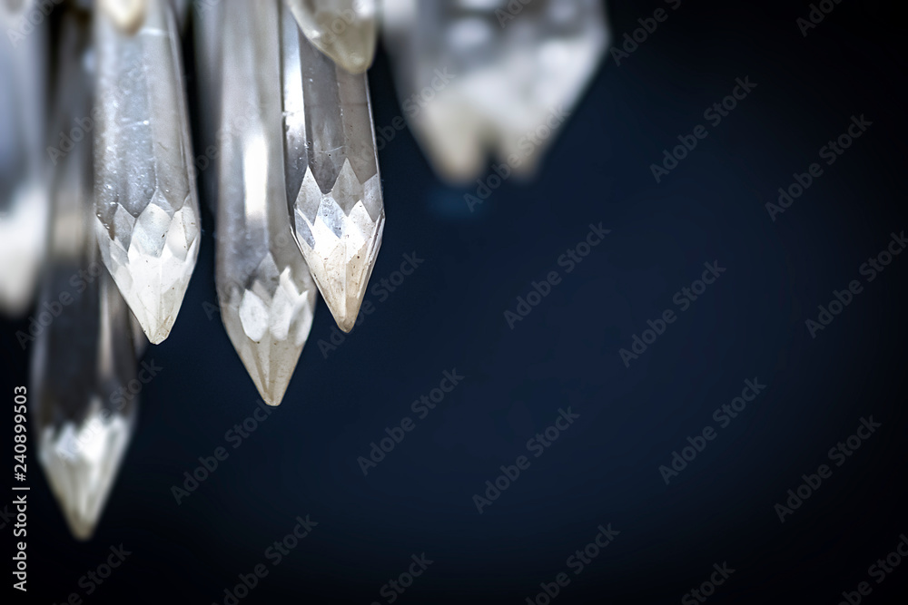detail of glass crystals of an ancient chandelier detail of glass crystals of an ancient chandelier