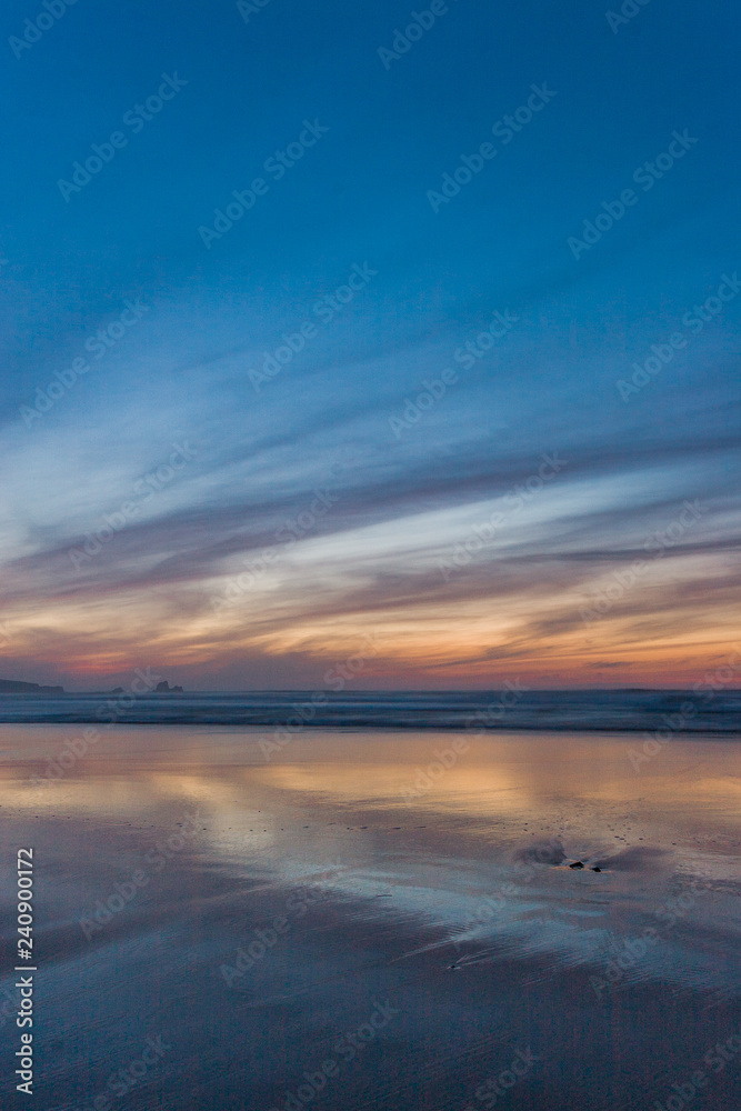 Colors of sunset at Valdearenas beach. Cantabria, Spain.