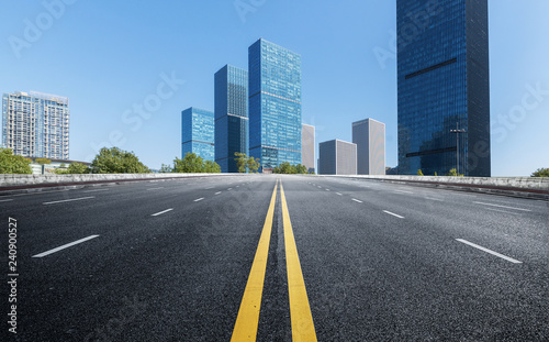 Empty road floor surface with modern city landmark buildings of hangzhou bund Skyline zhejiang china