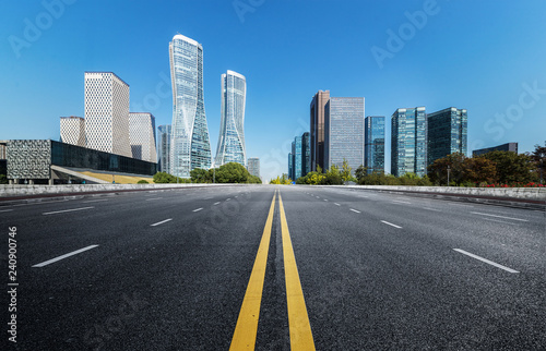 Empty road floor surface with modern city landmark buildings of hangzhou bund Skyline zhejiang china