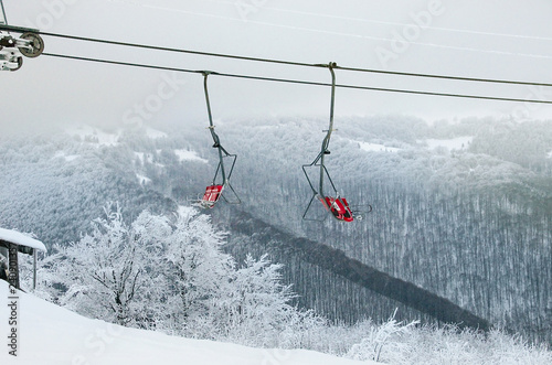Ski lift ski resort. Winter fun. Family holidays and travel in the mountains. Nature forest landscape