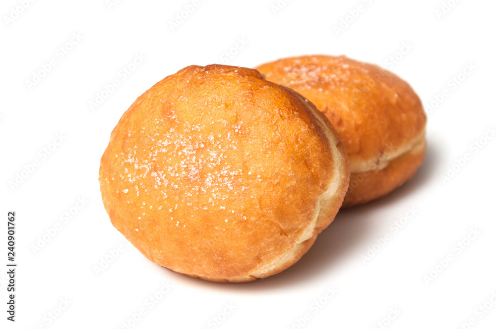 closeup of dough nut on white background closeup of dough nut on white background