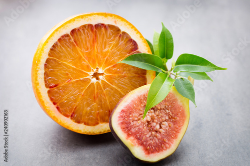 Bloody Sicilian oranges and figs. Shallow depth of field.