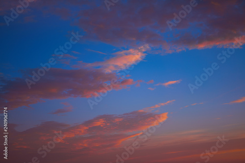 Sunset sky clouds orange and blue