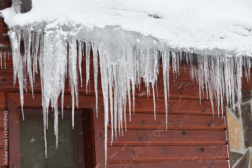 icicles hanging from the roofs of houses danger injury to people
