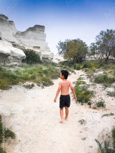 Boy walking on sand © bruno135_406