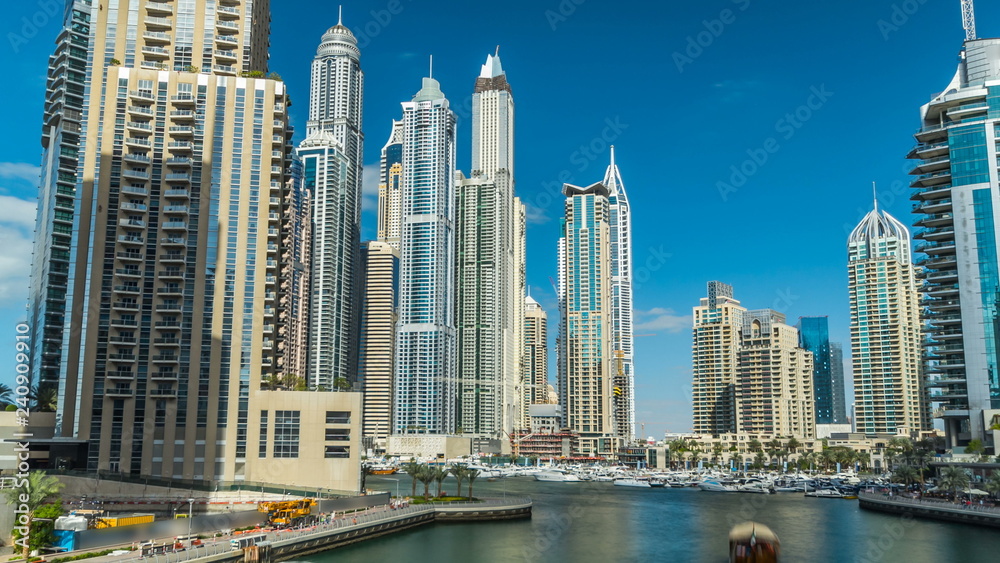 Obraz premium View of Dubai Marina Towers and canal in Dubai timelapse hyperlapse