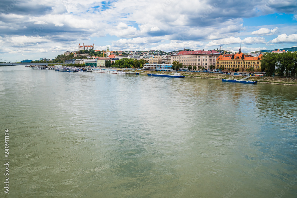 Cityscape of Bratislava with the SNP bridge over Danube river and castle. Bratislava, Slovakia
