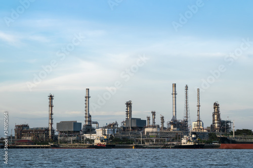 The oil refinery is located by the river. And ship transportation in bangkok Thailand