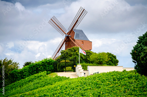 Champagne. Vineyard and windmill Champagne Region near Vernezay France photo