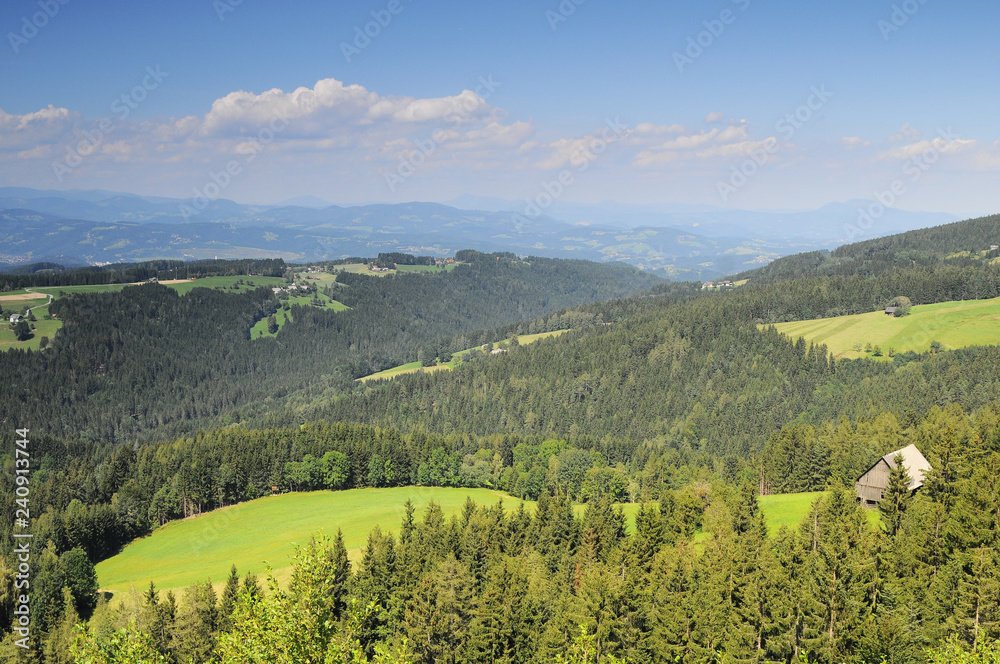 Stunning landscape in Austria with village, forest, mountain and cloud Stunning landscape in Austria with village, forest, mountain and cloud