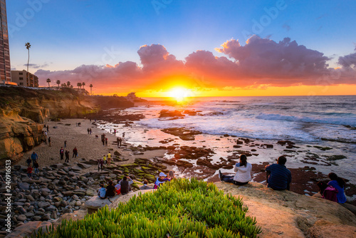Tourists watching the beautifal sunset at La Jolla, San Diego, CA