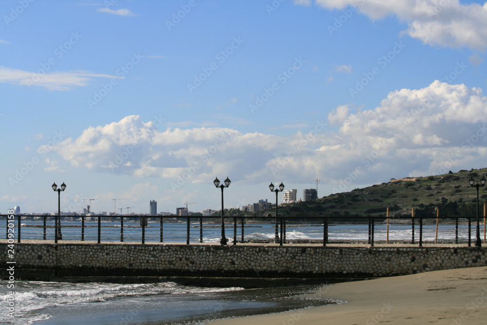 View of a pier, the sky, the Mediterranean sea and the Limassol seafront in December