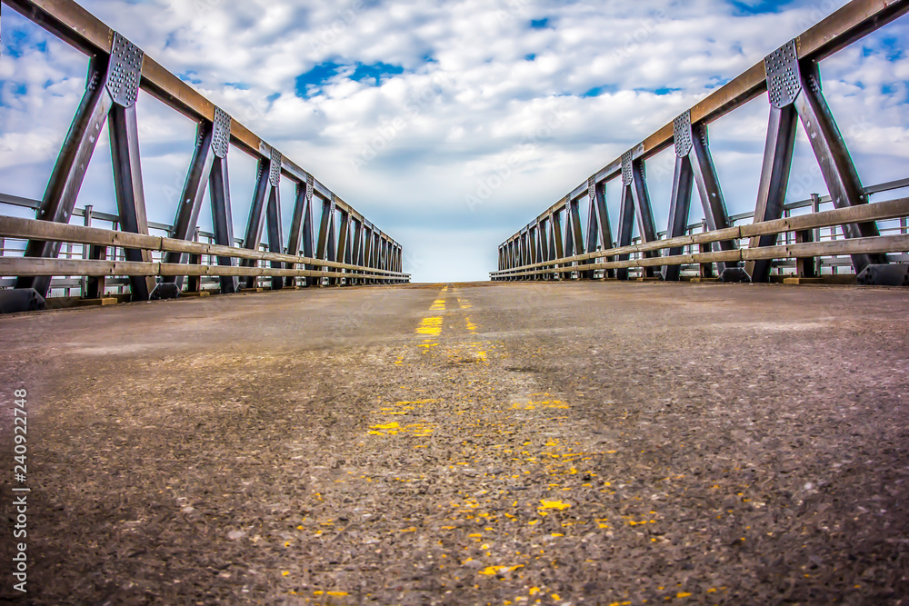 Fototapeta premium center yellow line of a bridge