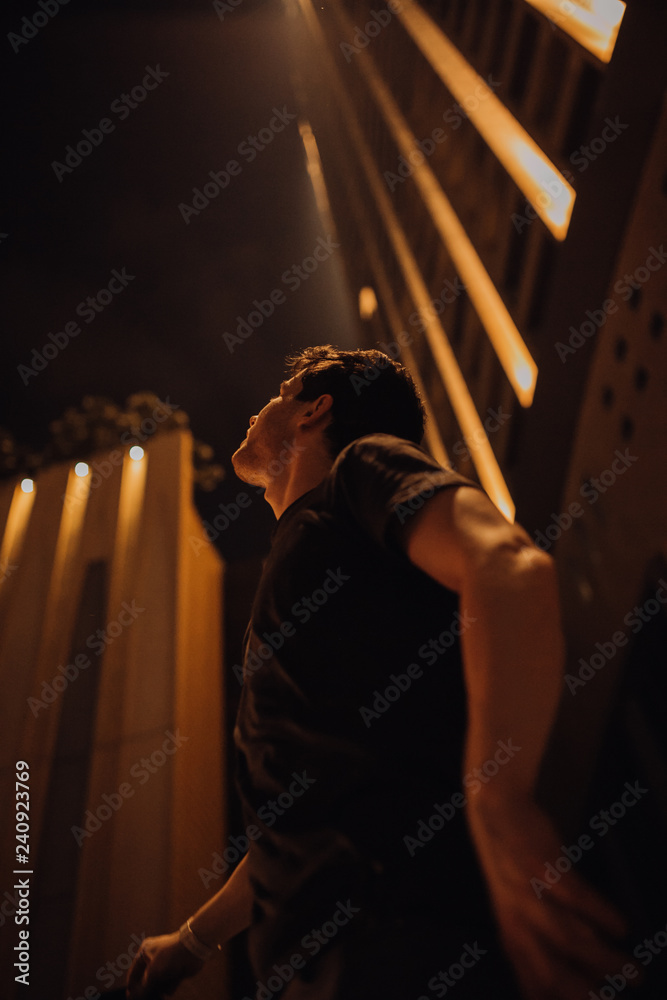 Young handsome man wearing a fashionable outfit in the city