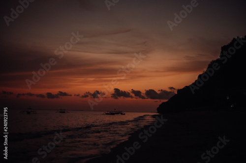 sunset on bech sea ocean . cloud . silhouette