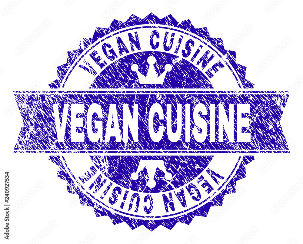 Obraz premium VEGAN CUISINE rosette stamp seal watermark with distress texture. Designed with round rosette, ribbon and small crowns. Blue vector rubber watermark of VEGAN CUISINE caption with dirty texture.