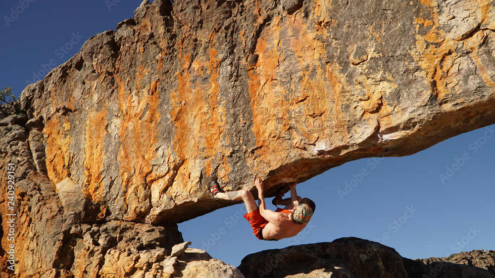 Climber on the "Rhino" Bouldering Rock in Rocklands near Cape Town, South  Africa. Stock Photo | Adobe Stock