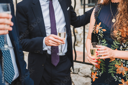 Wallpaper Mural People drinking champagne or sparkling wine at a social event or party Torontodigital.ca