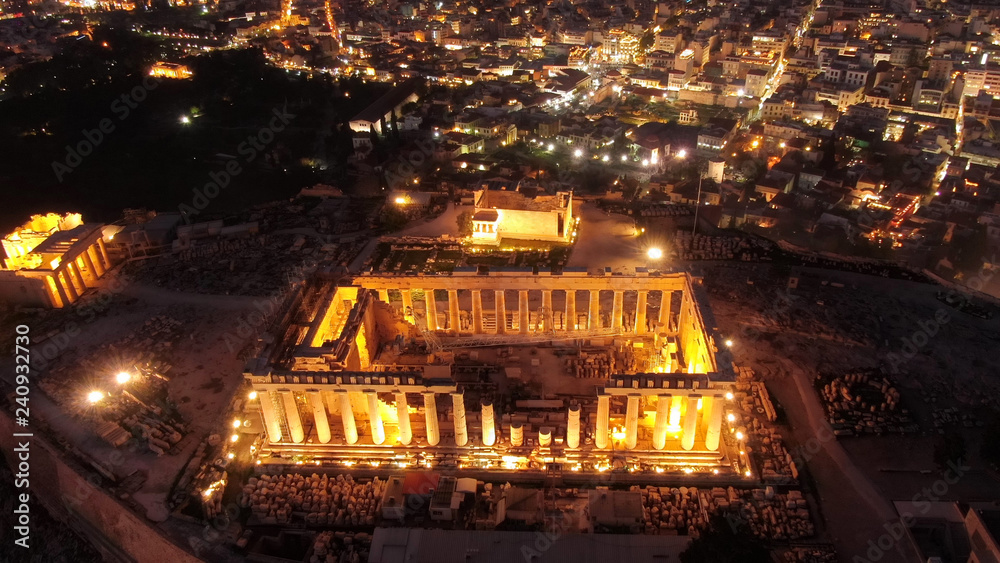 Aerial drone detail night shot of iconic Acropolis hill and the Parthenon a masterpiece of ancient Western civilisation, Athens historic centre, Attica, Greece