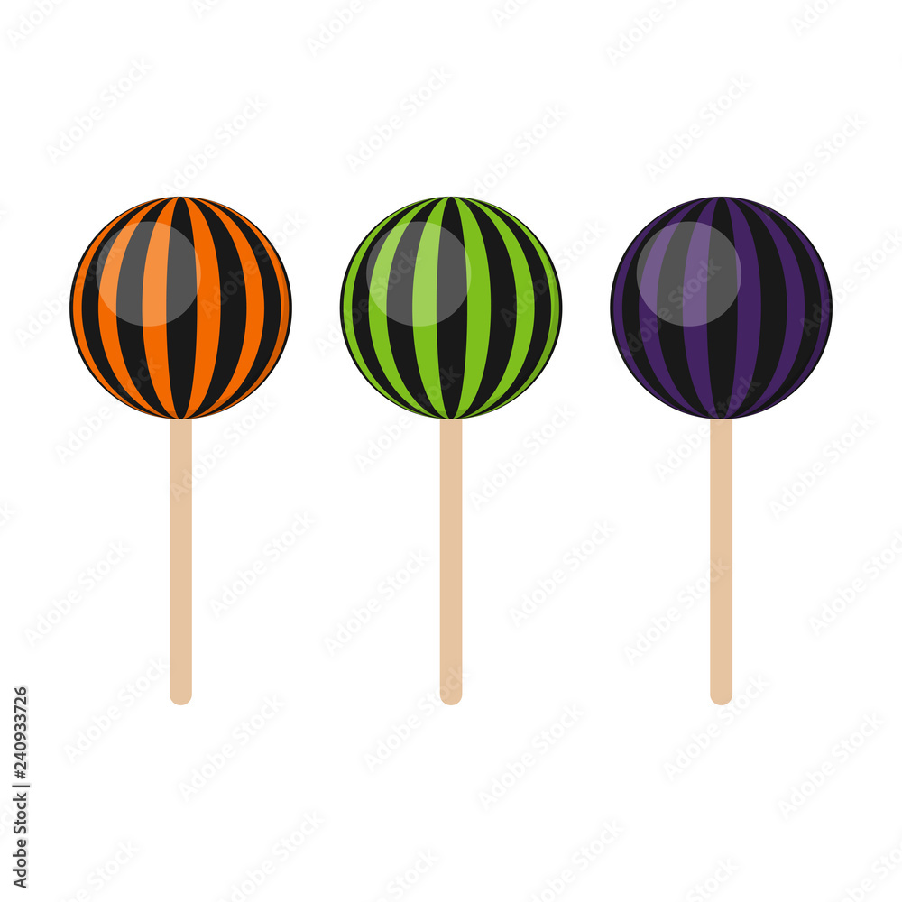Colorful Halloween Candy - Halloween candy striped lollipops isolated on white background Colorful Halloween Candy - Halloween candy striped lollipops isolated on white background