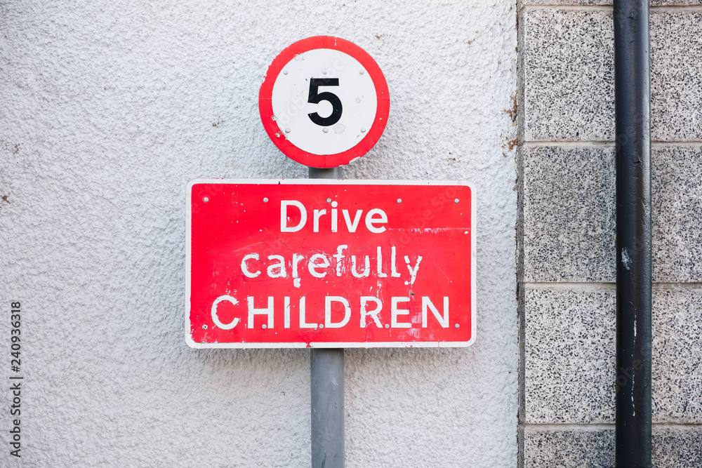 5 mph road sign post at school for safety of children 5 mph road sign post at school for safety of children